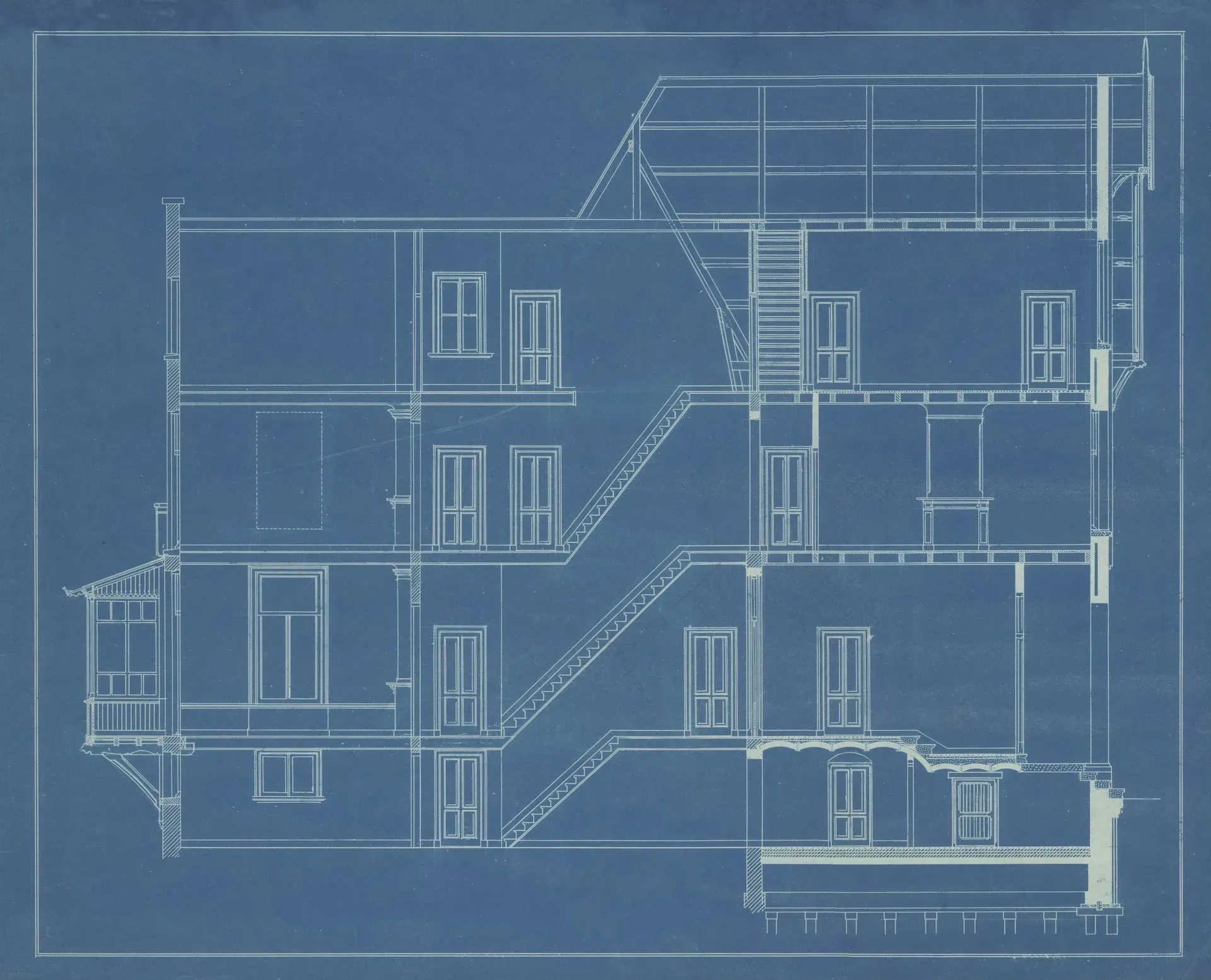 Architectural elevation and section drawings of a multi-storey building